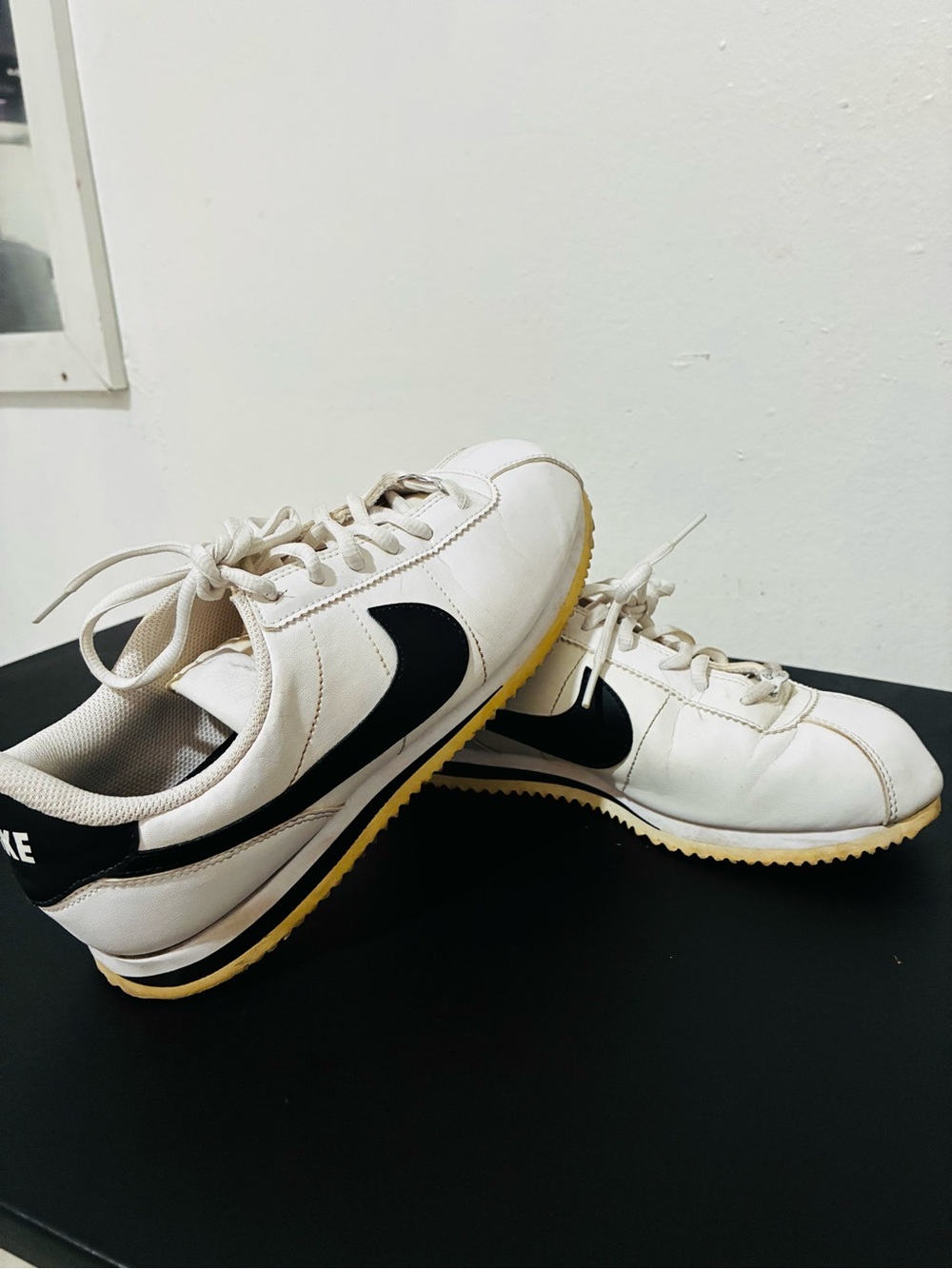 Nike Men’s White Sneakers with Black Swoosh and Gum Sole